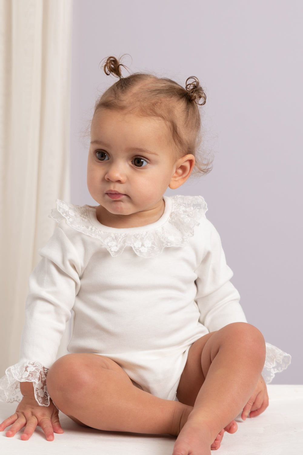 Ivory Long-Sleeve Bodysuit with Lace Collar and Cuff Embellishments