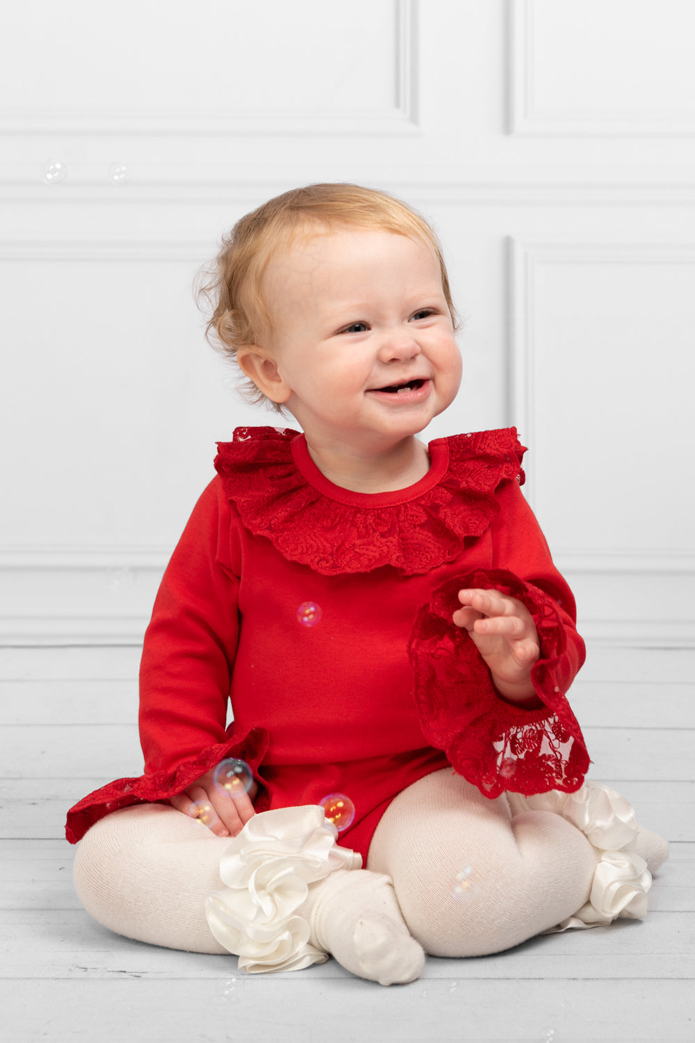 Red Long-Sleeve Bodysuit with Lace Collar and Cuff Details