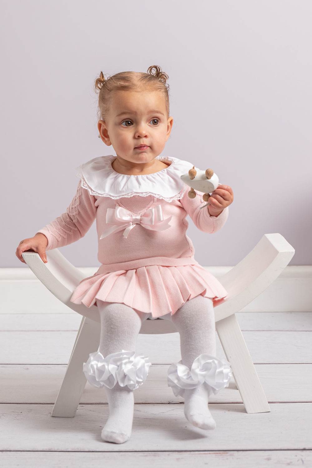 Pink Knitted Baby Dress with Lace Collar and Bow Detail