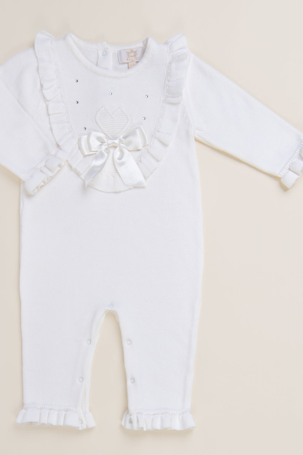 Ivory Knitted Baby Romper with Ruffles and Satin Bow