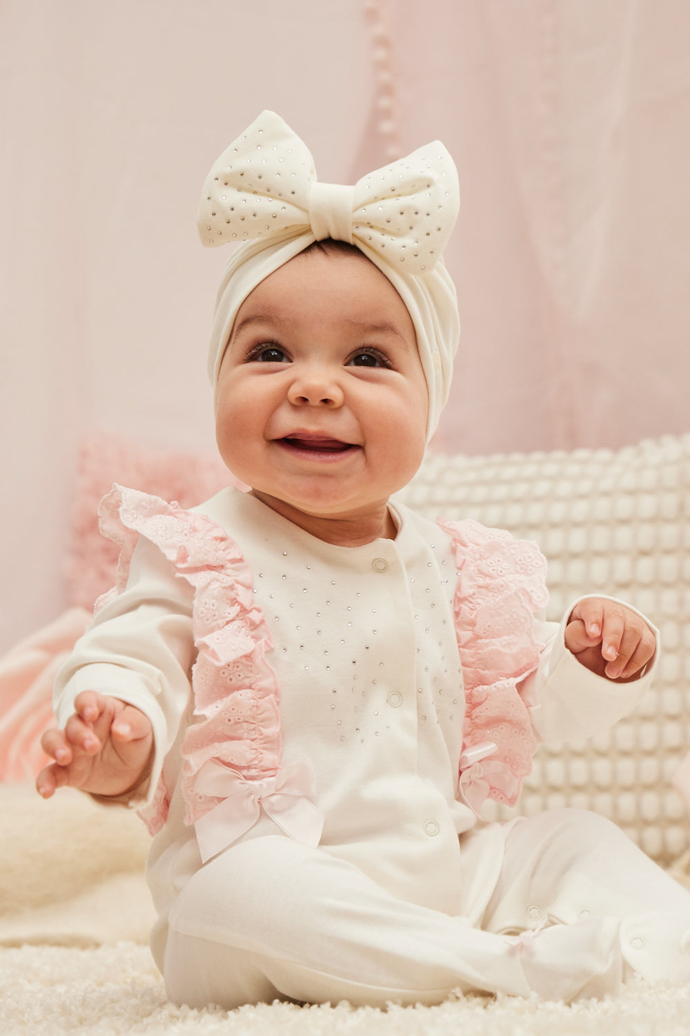 Ivory Baby Sleepsuit with Ruffle Trim