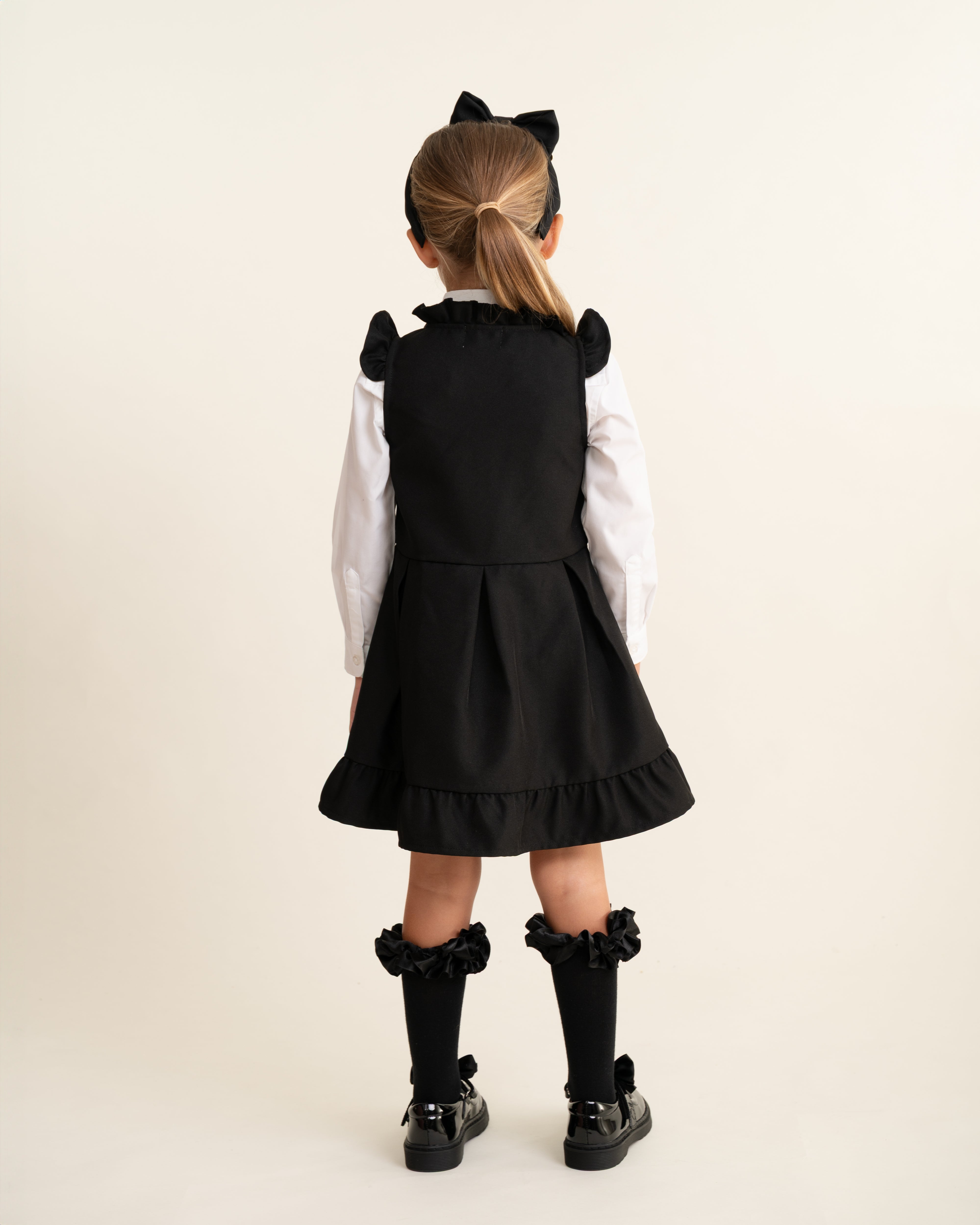Black Zip Front Pinafore with Bow Details