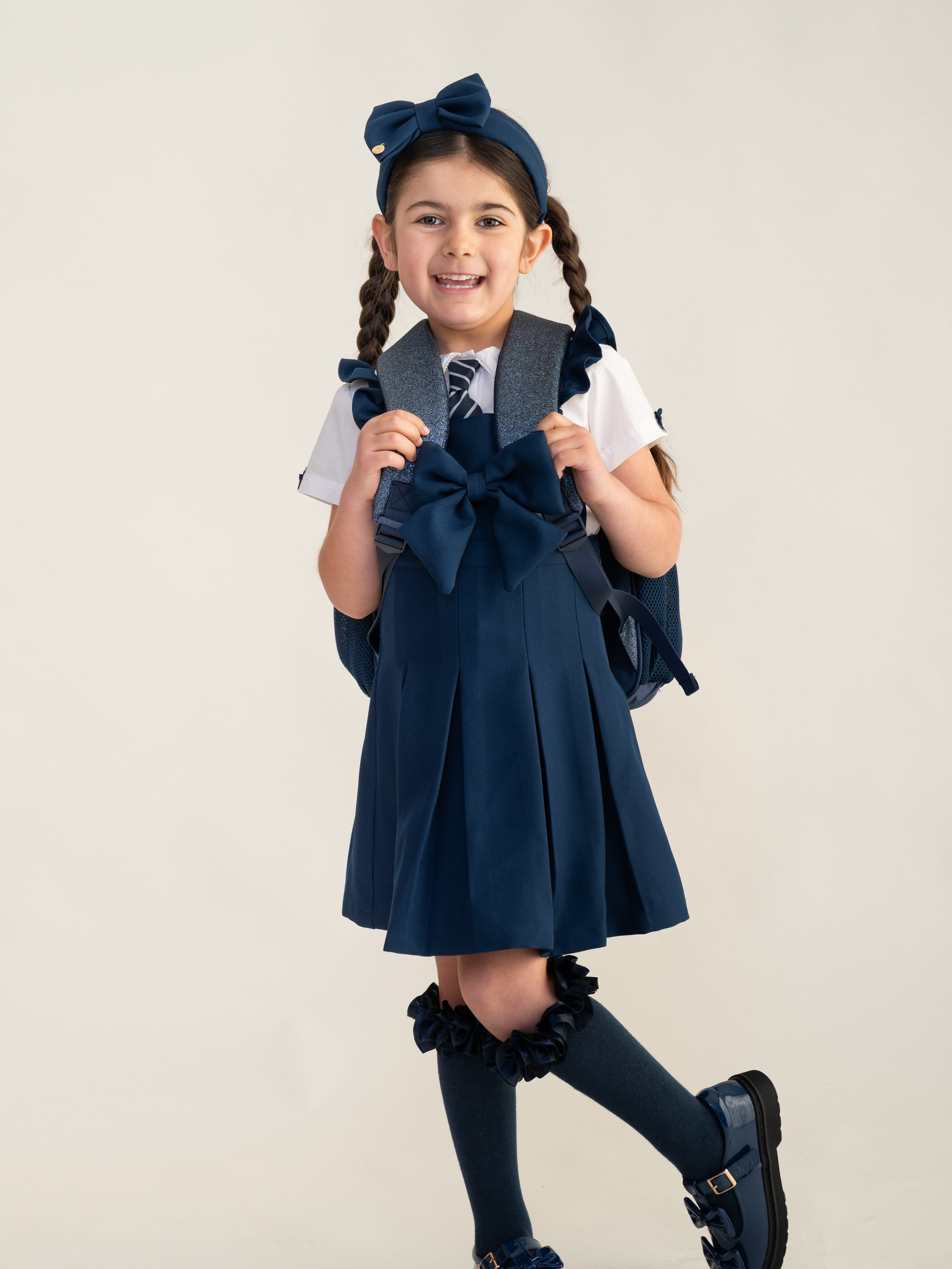 Navy Frill Pinafore School Dress with Bow