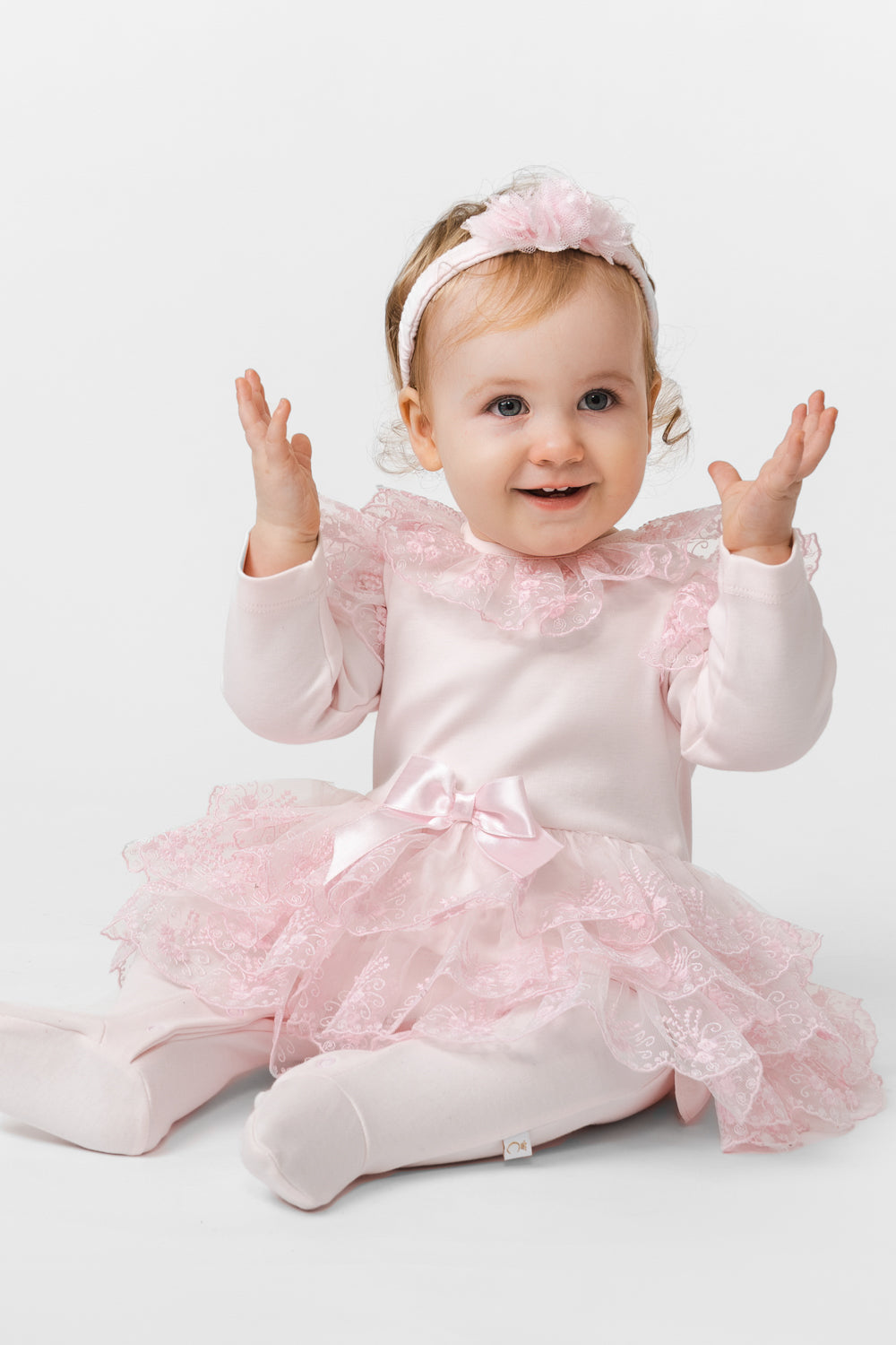 Pink Baby Romper with Lace Overlay and Satin Bow