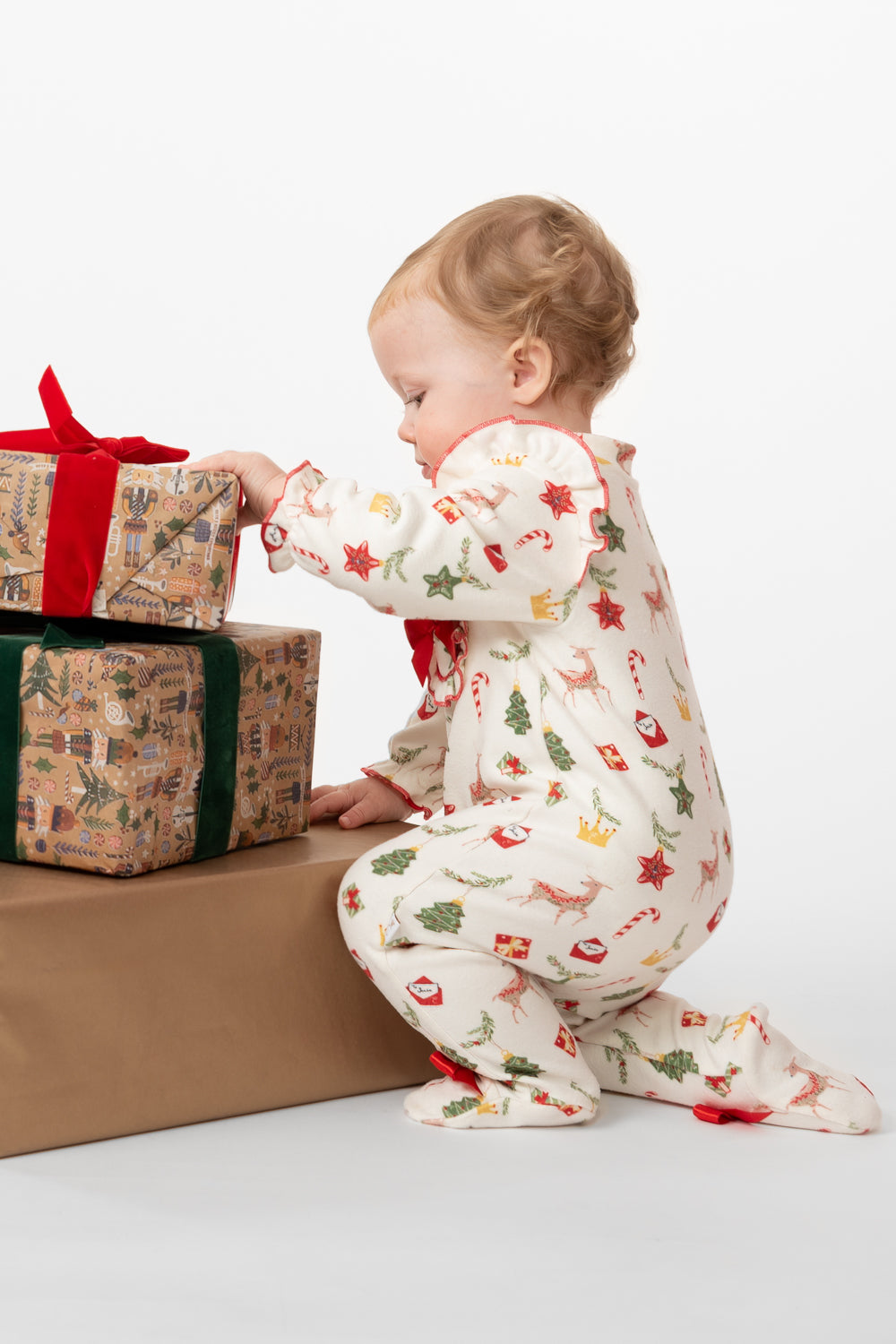 Festive Holiday Baby Romper with Red Bows and Matching Hat