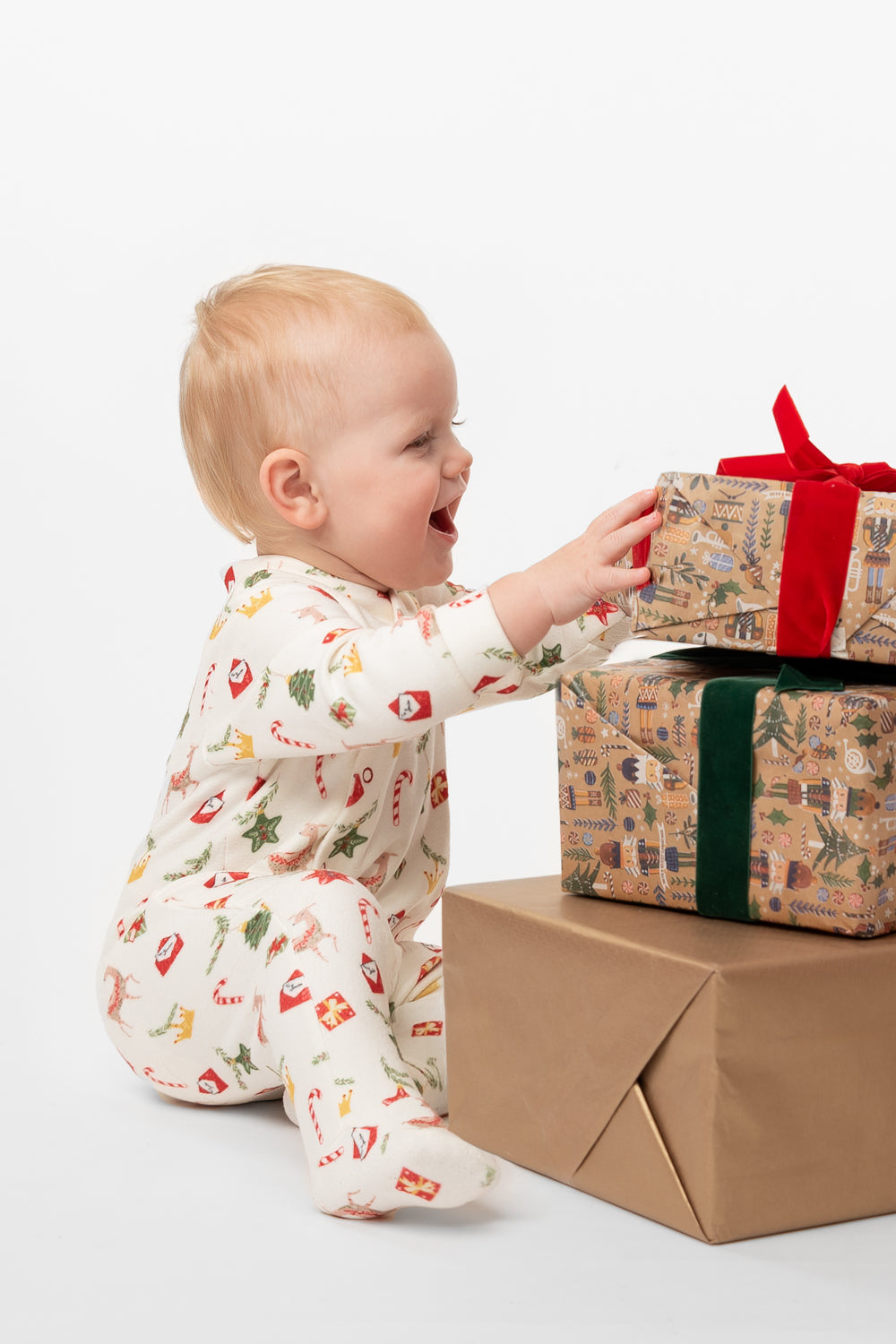 Festive Holiday Baby Romper with Red Bows and Matching Hat