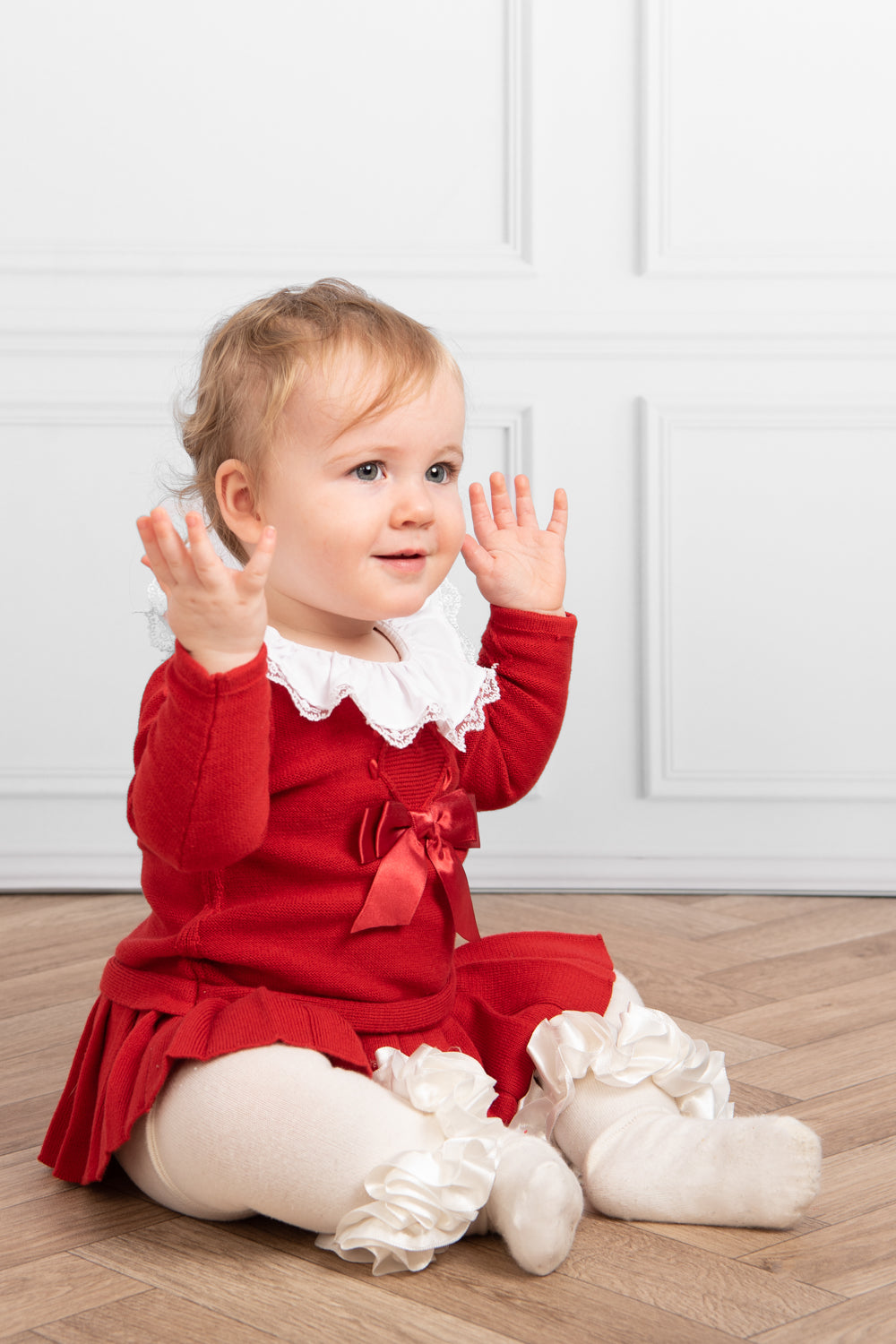 Red Knitted Baby Dress with Lace Collar and Bow Detail