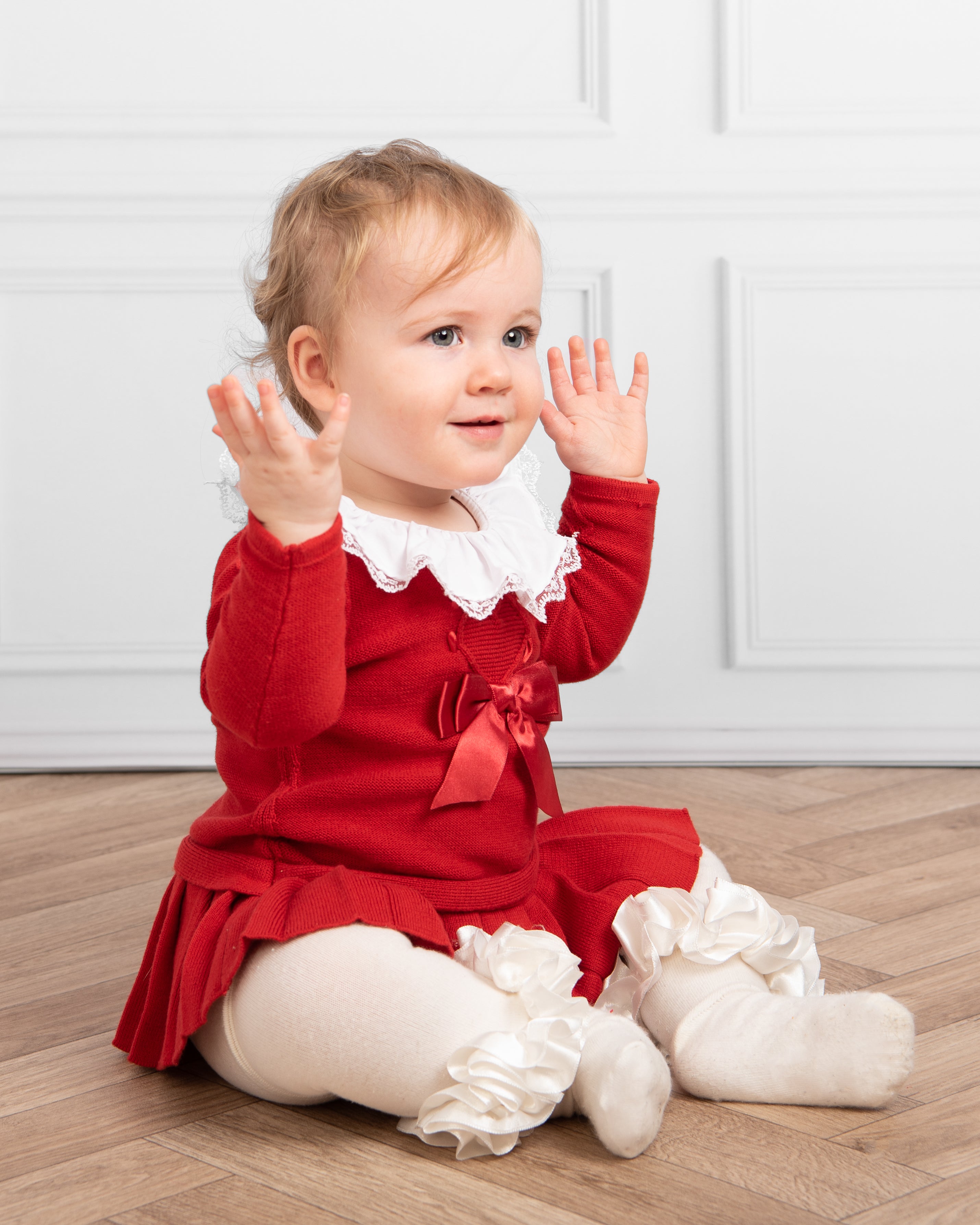 Red Knitted Baby Dress with Lace Collar and Bow Detail