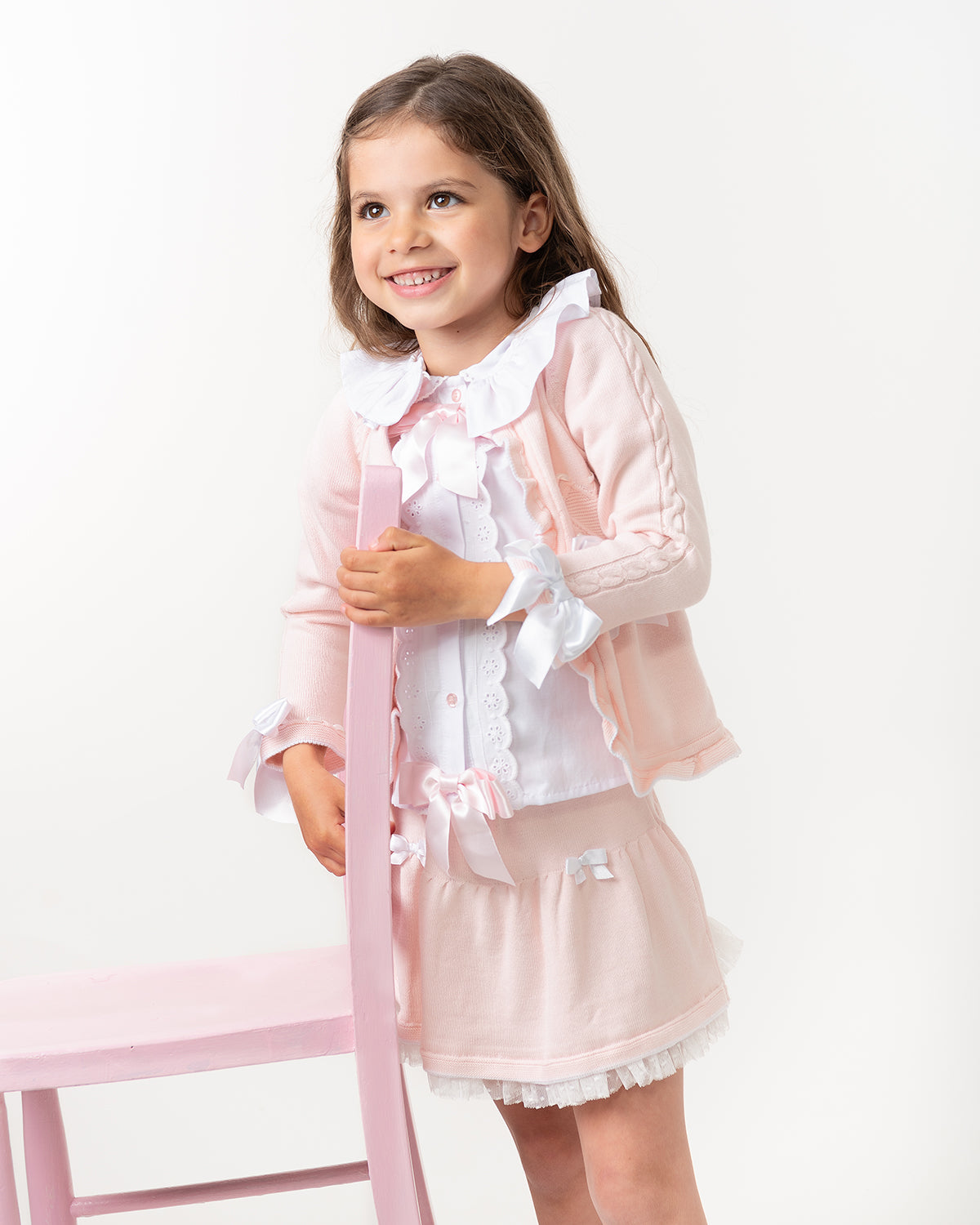 Pink Three-Piece Girls' Set with Cardigan, Shirt, and Skirt