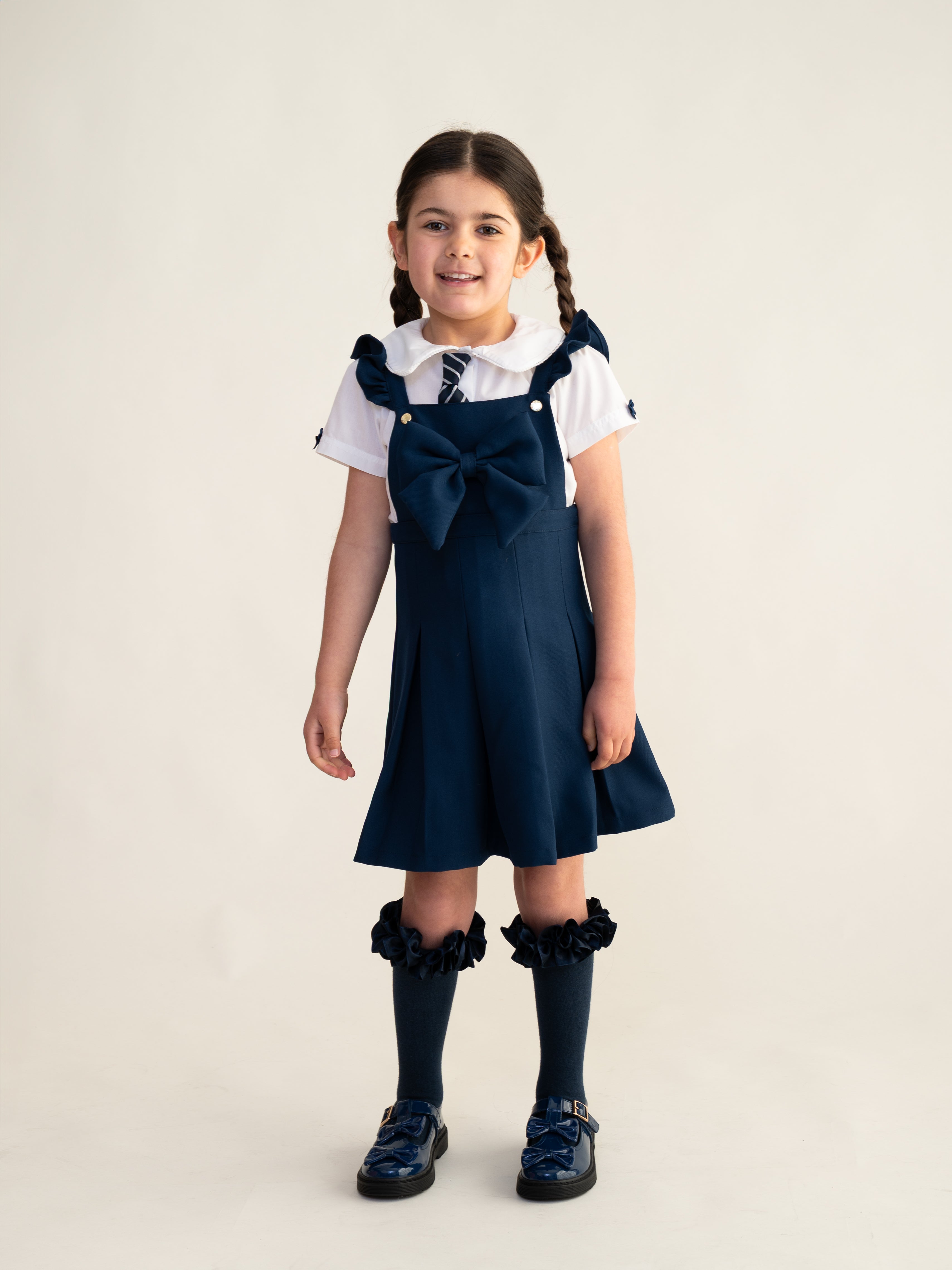 Navy Frill Pinafore School Dress with Bow