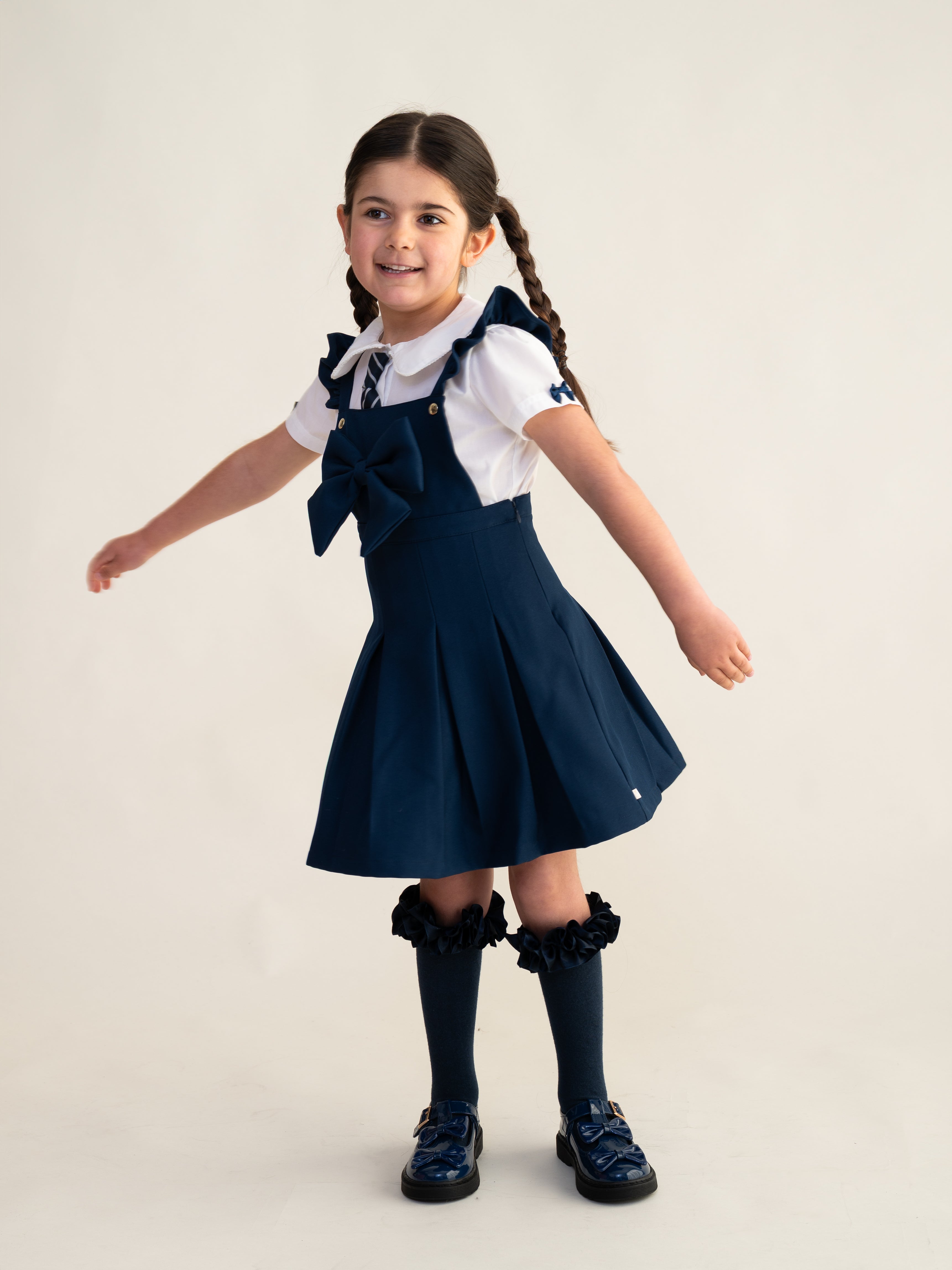 Navy Frill Pinafore School Dress with Bow
