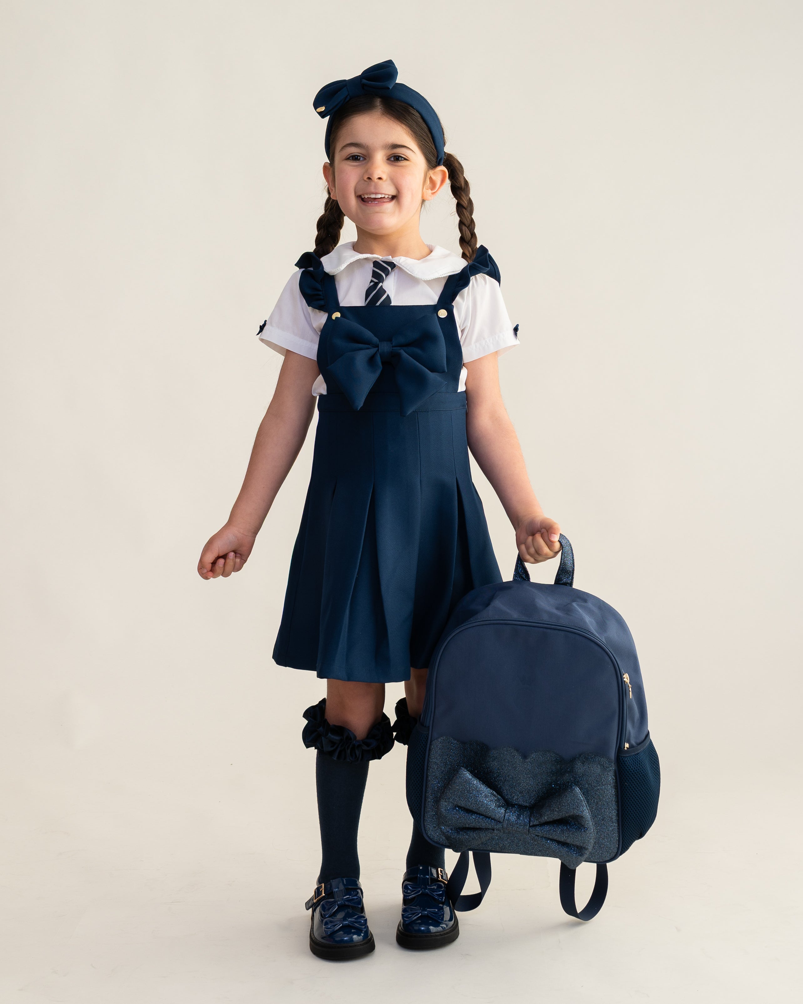 Navy Frill Pinafore School Dress with Bow