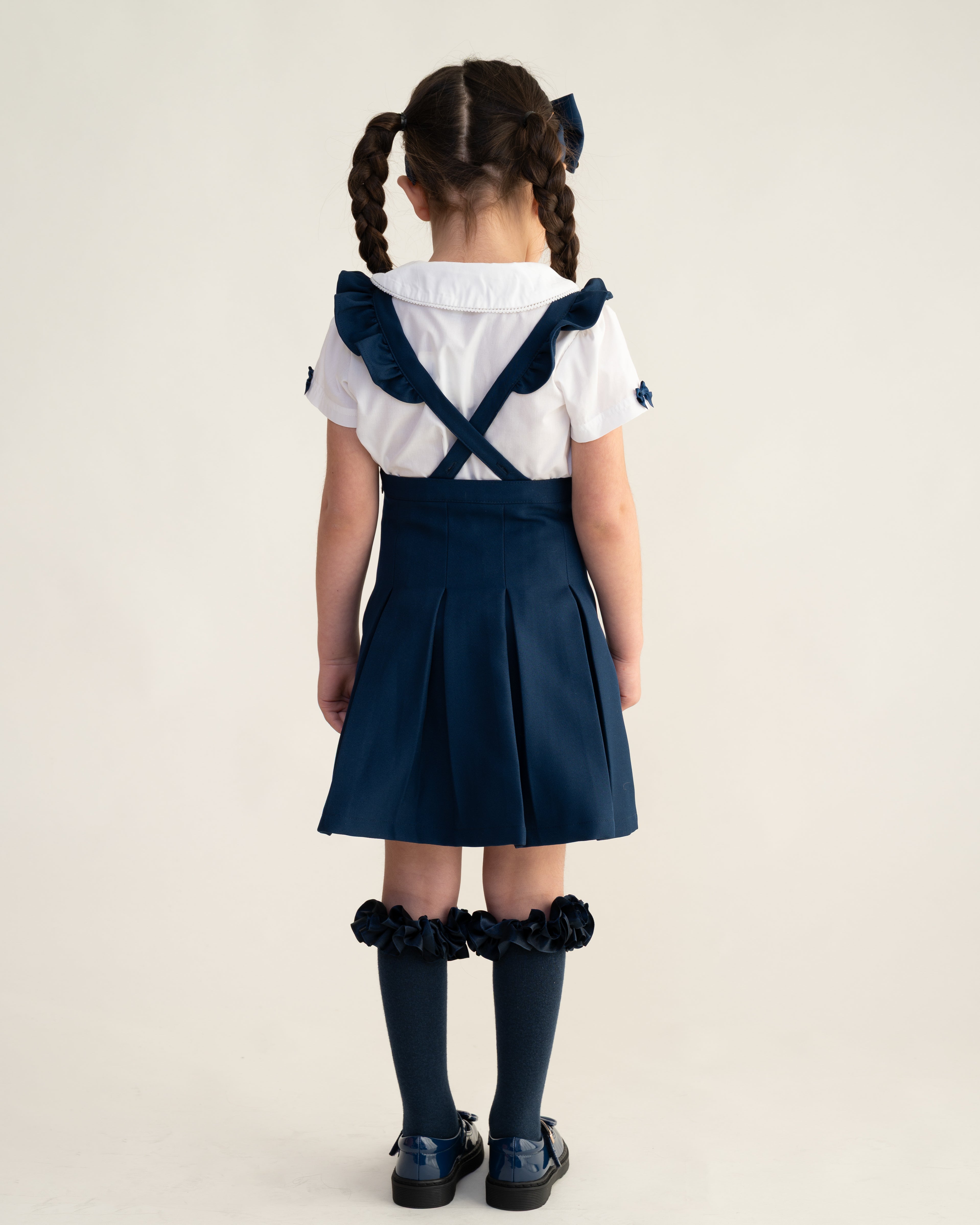 Navy Frill Pinafore School Dress with Bow