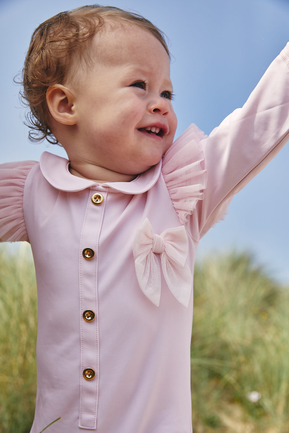 Pink Long-Sleeve Ruffle Sunsafe Swimsuit (UPF50)